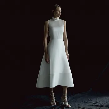 Простые белые платья для выпускного вечера трапециевидной формы для женщин 2023 года, плиссированные вечерние платья для вечеринок с высоким воротом, без рукавов чайной длины, сшитые на заказ